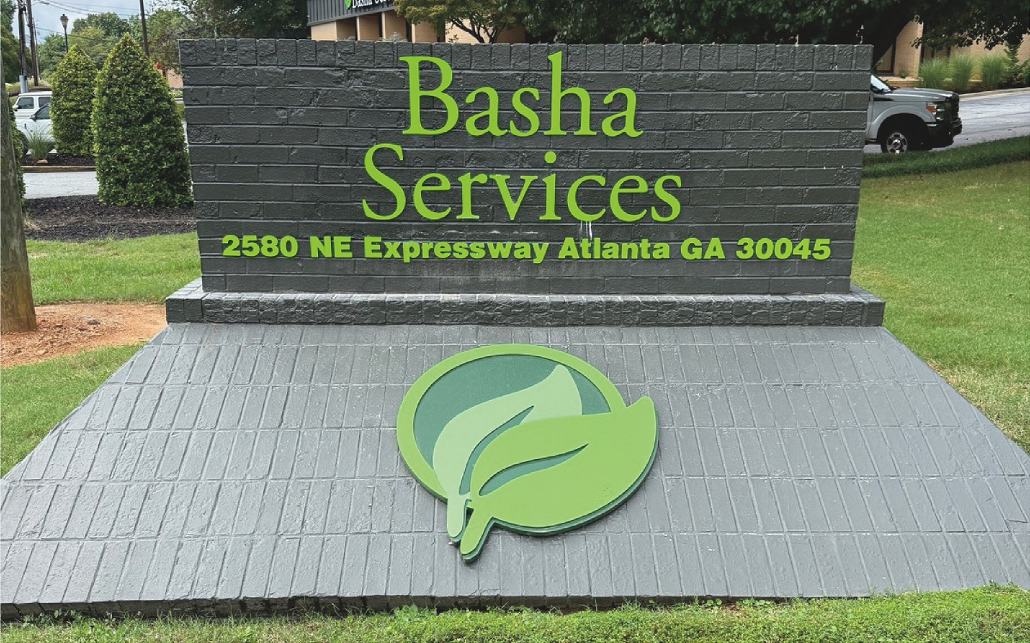 Outdoor land with grass and shrubs