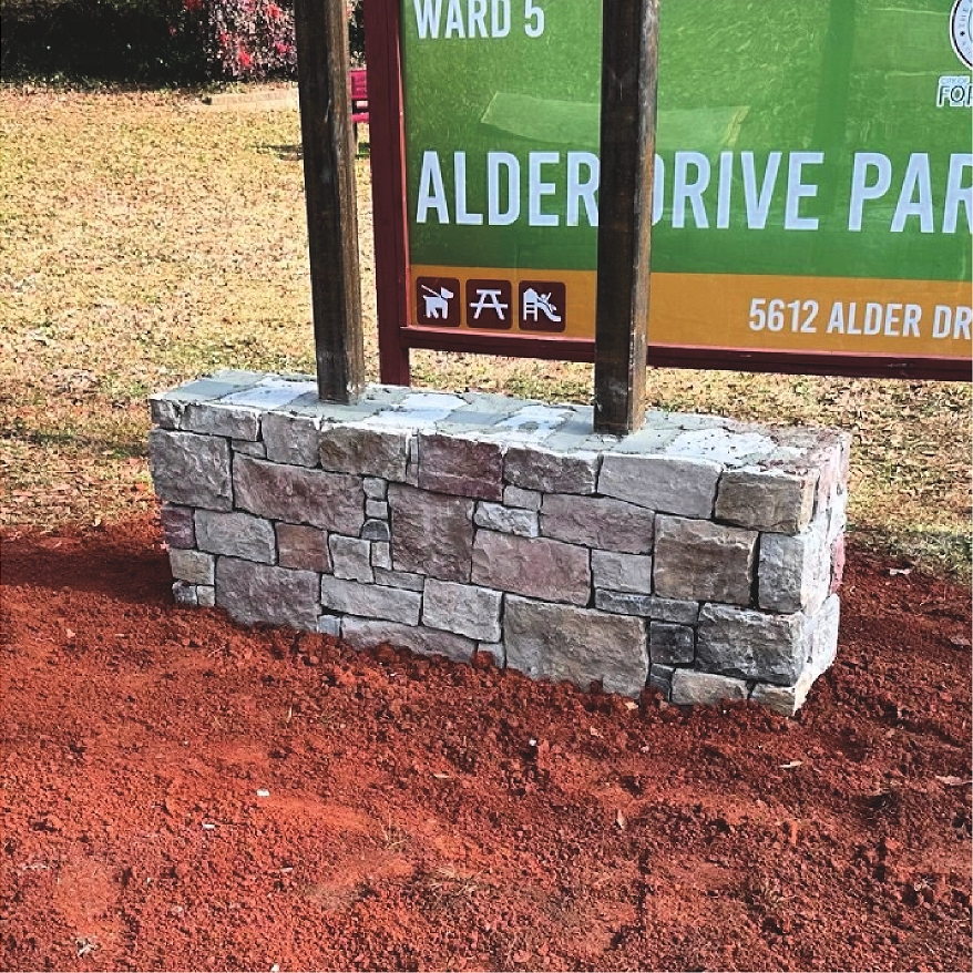Brick pathway through alder grove