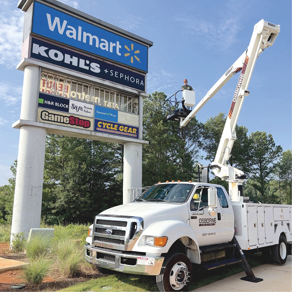 Blue cloudy sky, automobile on grassy land